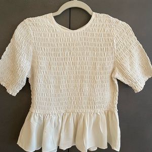 Smocked Peplum Shortsleeve Blouse